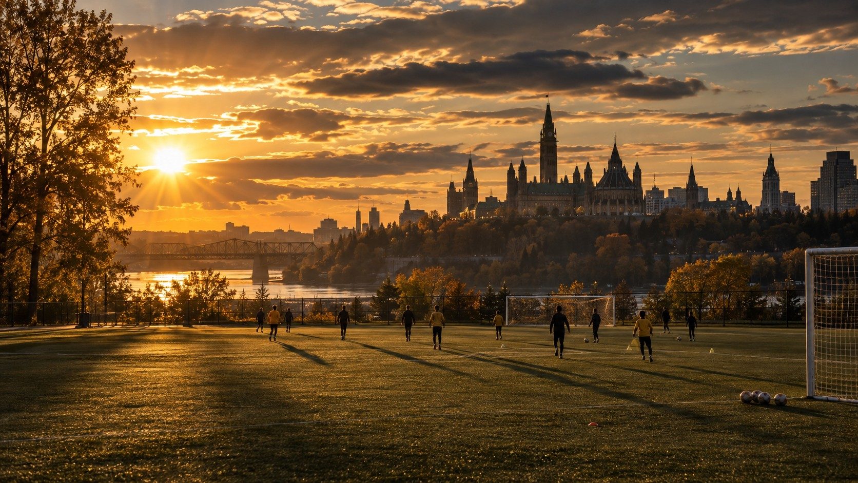 A pitch at golden hour with the Ottawa skyline in the distance